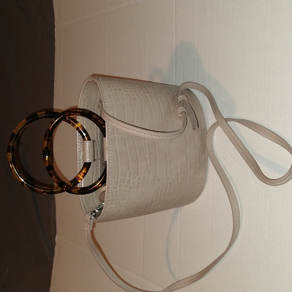 Elizabeth and James tan colored purse
